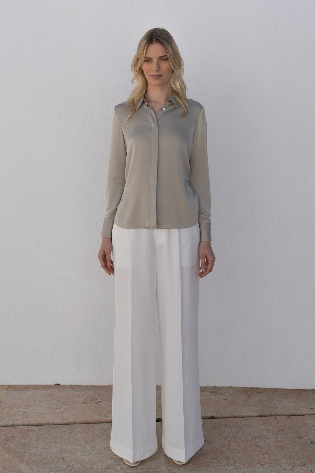 Quality white linen trousers showcasing timeless elegance and sophisticated tailoring.