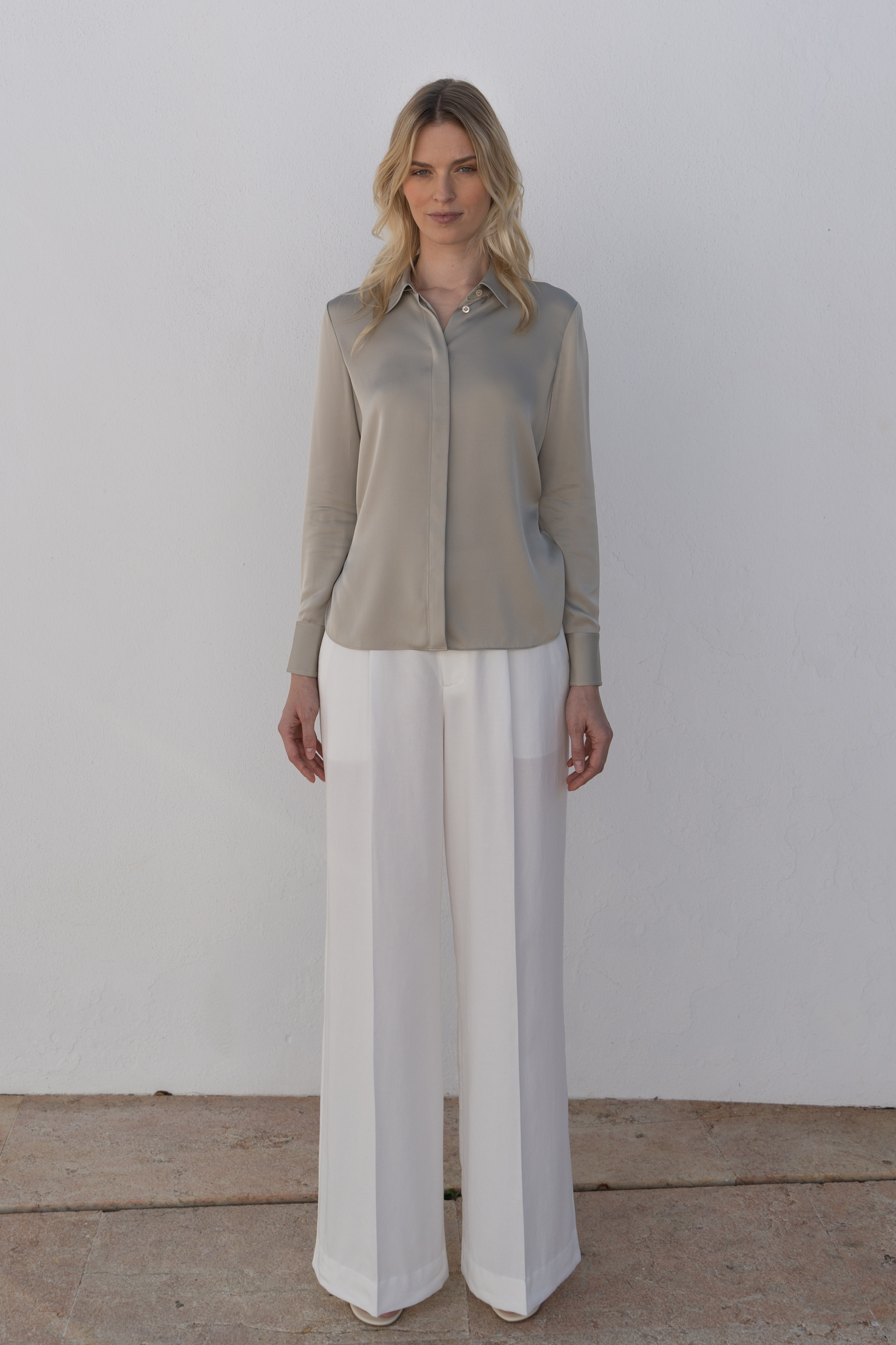 Quality white linen trousers showcasing timeless elegance and sophisticated tailoring.